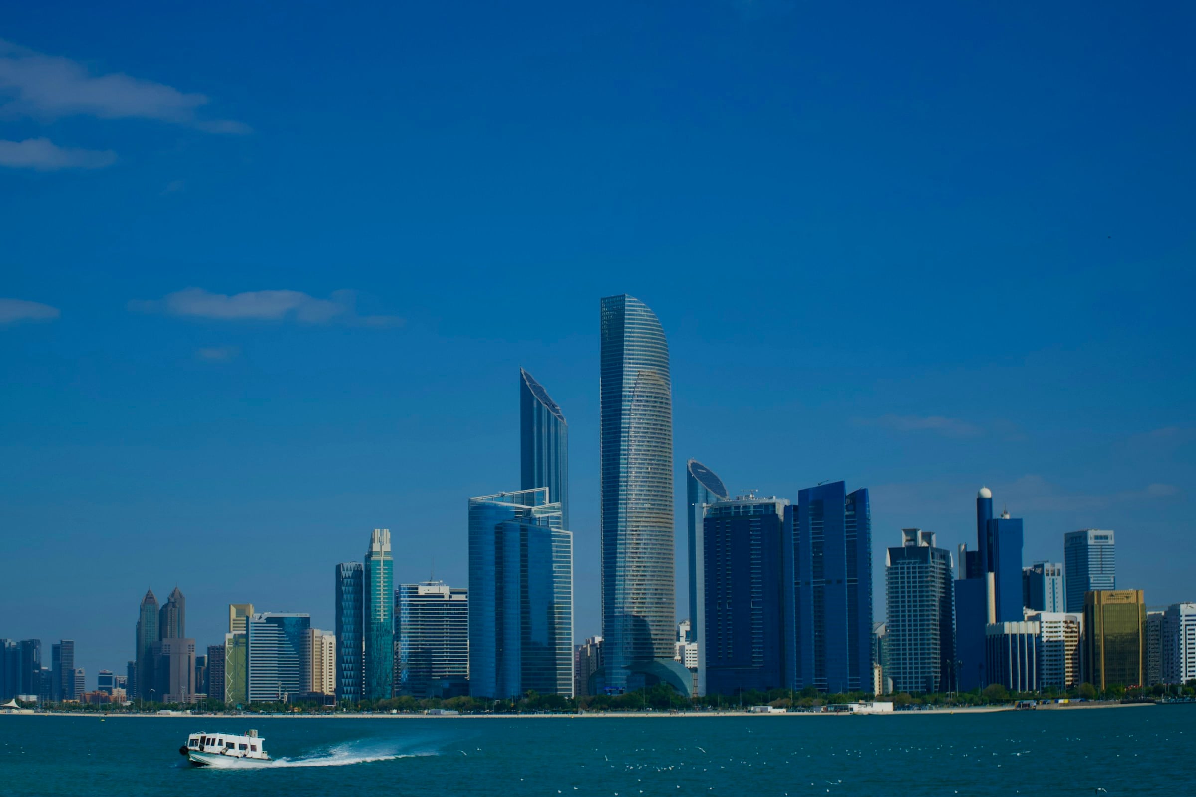 The Abu Dhabi skyline across the water